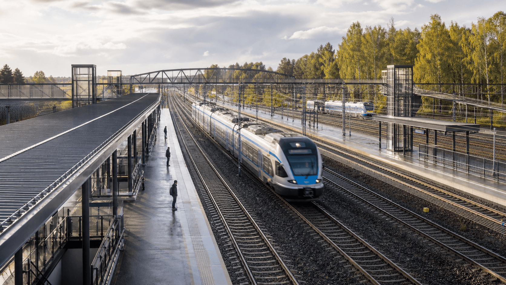 Editorial illustration of a rebuilt accessible Finnish station beside four electrified tracks